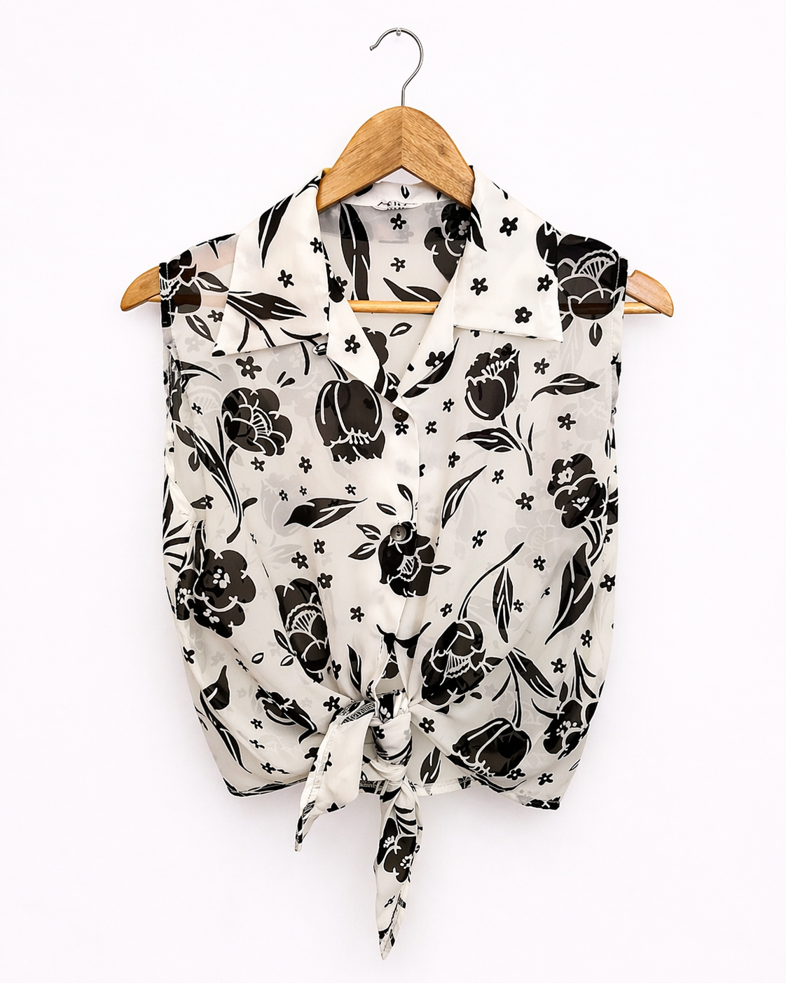 Camisa Vintage Sin Mangas Blanca con Flores Negras y Nudo